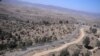 PAKISTAN -- Pakistani soldiers patrol next to a newly fenced border fencing along with Afghan's Paktika province border in Angoor Adda in Pakistan's South Waziristan tribal agency, October 18, 2017