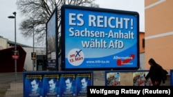 Plakat AfD-a na kojem piše: "Bilo je dosta, Saksonija glasa za AfD". Magdeburg, Njemačka, 13. mart 2016. 
