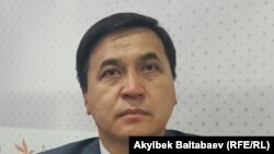 Каныбек Иманалиев.