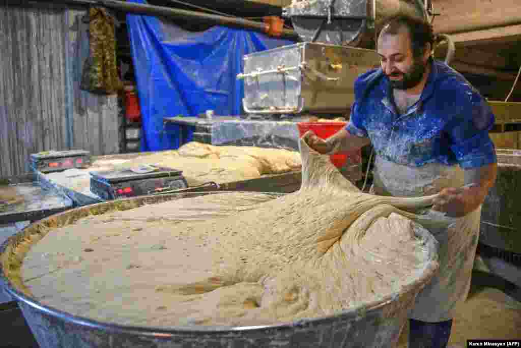 A baker prepares dough in Stepanakert on November 5. 