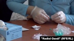 Ташхиси кӯдакон дар вилояти Хатлон. Акс аз бойгонӣ
