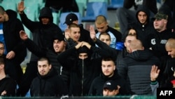 Bulgaria's game against England was halted twice due to abuse from sections occupied by supporters of the Bulgarian team, including monkey chants and apparent Nazi salutes.