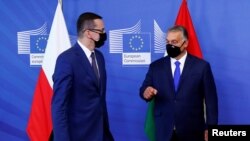 Премиерът на Полша Матеуш Моравецки и на Унгария Виктор Орбан