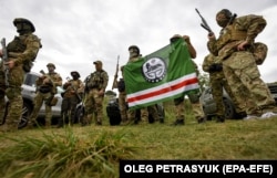 Бійці батальйону імені Джохара Дудаєва, які воюють на боці України у війні з Росією під час вишколу неподалік Києва, 27 серпня 2022 року
