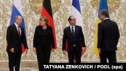 «Нормандська четвірка»: (справа наліво) керівники України, Франції, Німеччини і Росії. Мінськ, 11 лютого 2015 року