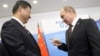 Kremlin Calm As China's Clout Rises In Russia's Backyard