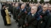 An Orthodox priest blesses young recruits to Ukraine's armed forces in 2013, which was the final year in which conscripts were called up to the army. 