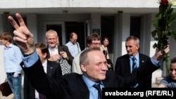 Former Belarusian presidential candidate Uladzimer Nyaklyaeu greeting supporters after being given a suspended sentence for organizing postelection protests last December.