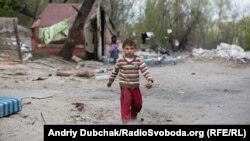 Фоторепортаж: У таборі ромів на Троєщині