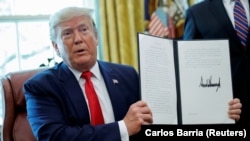 Дональд Трамп Ак үйдө журналисттер менен жолугушууда. 1-июль, 2019-жыл. 