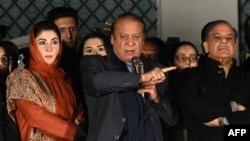 Former Pakistani Prime Minister Nawaz Sharif (center) addresses supporters on February 9.