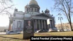 On April 3, two activists were detained in St. Petersburg over a similar mock Putin gravestone placed near the iconic St. Isaac's Cathedral. 