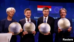 Svečano potpisivanje ugovora o uvođenju eura u Hrvatskoj, u Bruxellesu 12.07.2022. Photo: Reuters. 