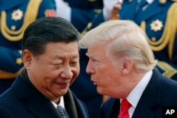 Президент США Дональд Трамп та китайськй ліідер Сі Цзіньпін під час зустрічі в Пекіні в 2017 році (архівне фото)