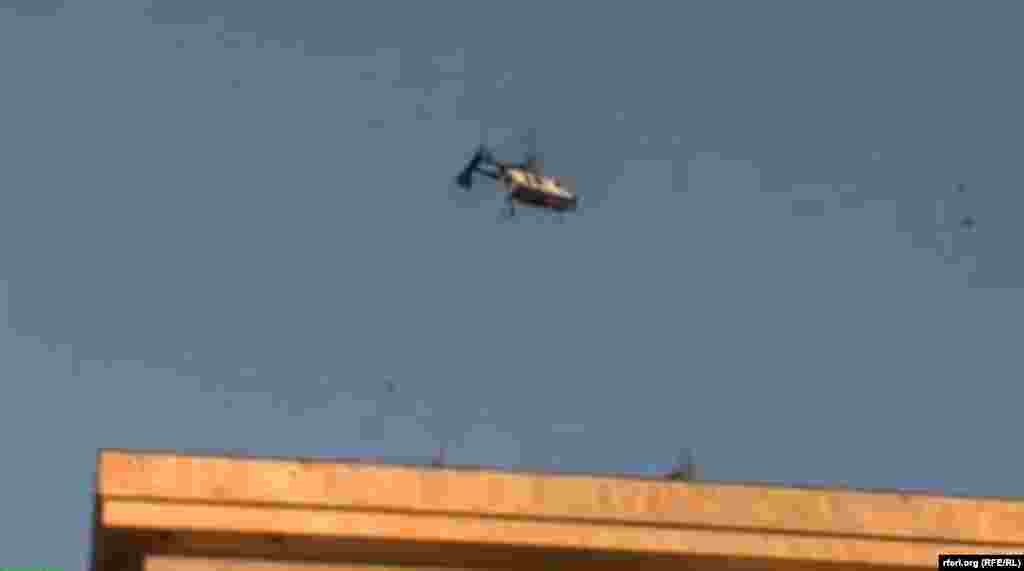 A police helicopter loomed over the crowd all afternoon and police were also seen photographing demonstrators. 