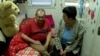 They Can't Go Home Again: Displaced Ukrainians Share Fears As Negotiations Drag On video grab 1