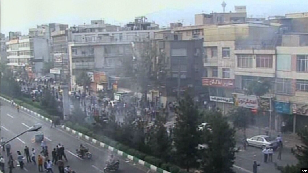 An image grab from Iran's official Press TV shows protesters in the streets of Tehran.