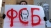  Під час одиночного пікету проти влади президента Володимира Путіна з вимогою звільнити політв'язнів. Москва, 27 жовтня 2012 року