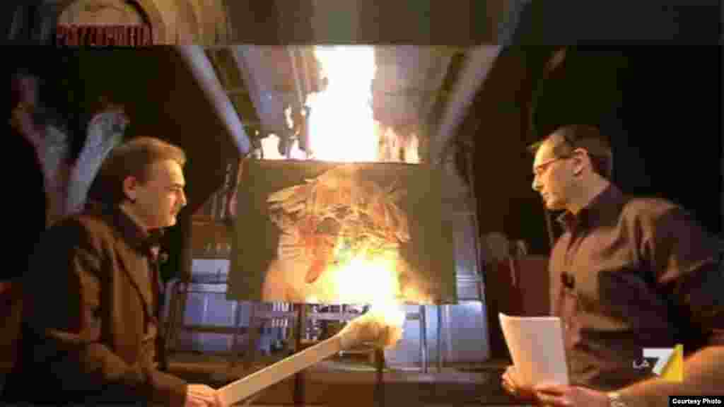 An Italian TV crew was on hand to record the painting's destruction.
