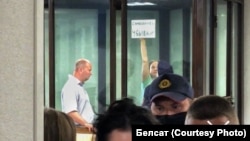 Палітзьняволеная актывістка Паліна Шарэнда-Панасюк у судовай залі. Архіўнае фота