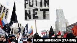 People attend an opposition rally in Moscow against the bill on sovereign RuNet and censorship on the Internet on March 10.