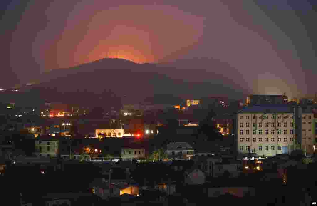 Fires burn in the forest around Stepanakert amid fighting on November 5. 