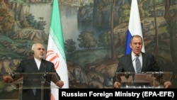 RUSSIA -- Russian Foreign Minister Sergei Lavrov (R) holds a joint news conference with his Iranian counterpart Mohammad Javad Zarif following their bilateral talks in Moscow, July 21, 2020