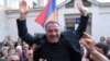 Armenia - Opposition leader Sasun Mikaelian receives a hero's welcome after being released from prison, 27May2011.