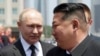 Президентът на Русия Владимир Путин и лидерът на Северна Корея Ким Чен-ун в Пхенян.