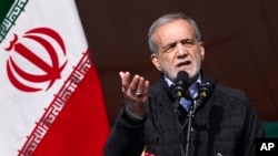 Iranian President Masoud Pezeshkian speaks during a rally in Tehran on February 10, 2025.