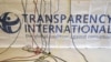 Germany -- Microphone cables dangle over a logo of Transparency International (TI) during a press conference in Berlin, 23Sep2008