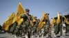 Explainer: How Iran Could Help Iraq Fight ISIL
