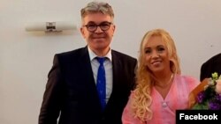 Judecătorul Ovidiu Galea și secretarul de stat Lilla Boglarka Debelka, fost șef al Departamentului pentru Românii de Pretutindeni 