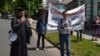 Ghenadie Valuta (left) has organized several anti-LGBT marches in Moldova.