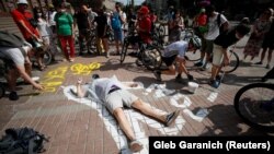 Kiev, protest al bicicliștilor care cer piste speciale în oraș.