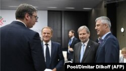 Aleksandar Vučić, Donald Tusk, Johanes Han i Hašim Tači u Briselu u vreme poslednje faze dijaloga