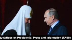 Президент Росії Володимир Путін (праворуч) і Московський патріарх Кирило (архівна світлина)
