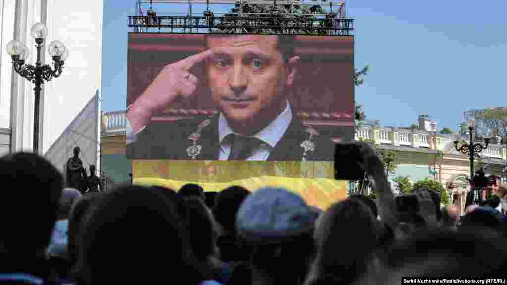 Spectators watch the inauguration ceremony.