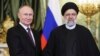 Руският президент Владимир Путин (вляво) и иранският му колега Ебрахим Раиси се срещнаха в Москва в края на 2023 г.
