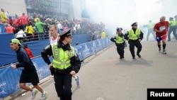 PHOTO GALLERY: Boston Marathon blasts kill three, injure more than 140 