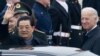Chinese President Hu Jintao waves upon his arrival at Andrews Air Force Base in Maryland, 18Jan2011