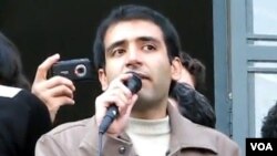 Iranian student activist Majid Tavakoli delivers a speech in an undated photo.