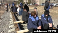 Armenia -- Workers of a copper smelter in Alaverdi block a nearby section of a railway, February 13, 2019.