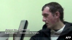 A Russian Channel One undated TV grab shows a man identified as Ilya Pyanzin, one of the suspected militants conspiring to kill Vladimir Putin, during an alleged confession to Ukrainian agents.