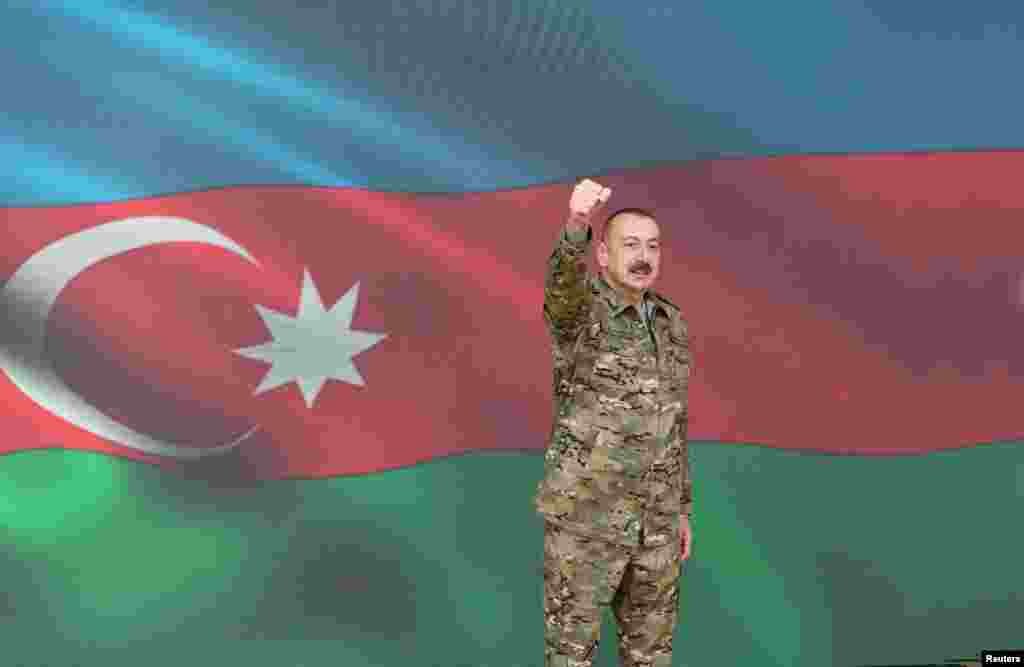 Azerbaijani President Ilham Aliyev gestures as he makes a televised address on November 8 announcing the capture of Shushi/Susa. 