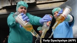 The consumption of bootleg alcohol is a problem across the former Soviet Union. (file photo)