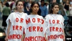 Demonstrators in Germany protest against torture and the execution of opposition protesters in Iran.