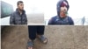 Bosnia-Herzegovina - Rizvan, migrant from Pakistan (l) and Ahmed, migrant from Morroco in camp Lipa near Bihac, 11Dec2020