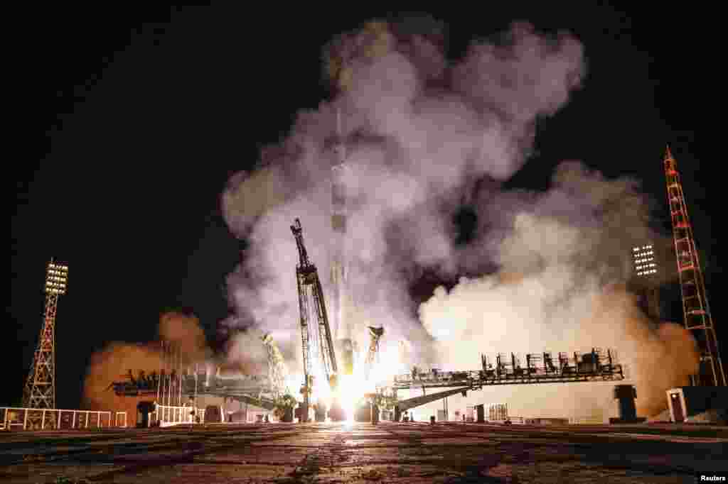 Over the intervening years, the International Space Station has hosted crew members from around the world. Here, a "Soyuz" TMA-10M spacecraft carrying the International Space Station crew of U.S. astronaut Michael Hopkins and Russian cosmonauts Oleg Kotov and Sergey Ryazanskiy blasts off from the launch pad at the Baikonur cosmodrome in Kazakhstan in September 2013.
