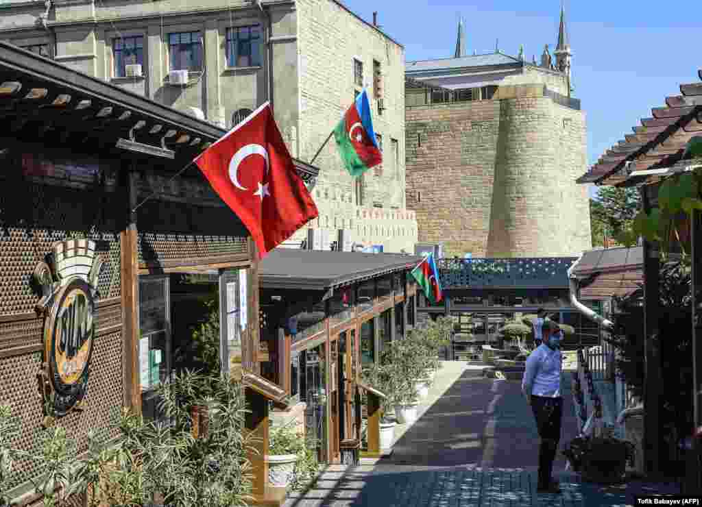 A restaurant displays Azerbaijani and Turkish flags in Baku's old town on October 14. 